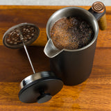 French press with coffee inside